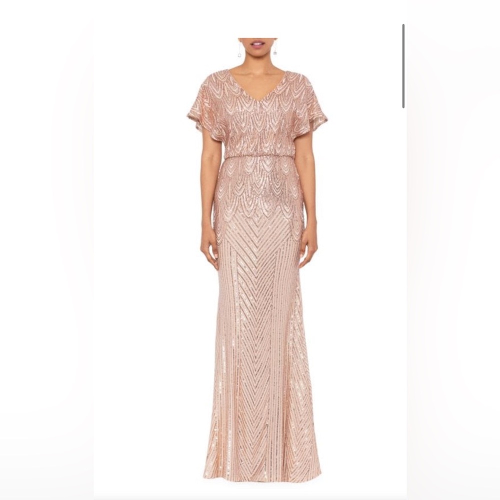 Betsy and Adam sequined v-neck gown. Light pink, perfect for a formal event.